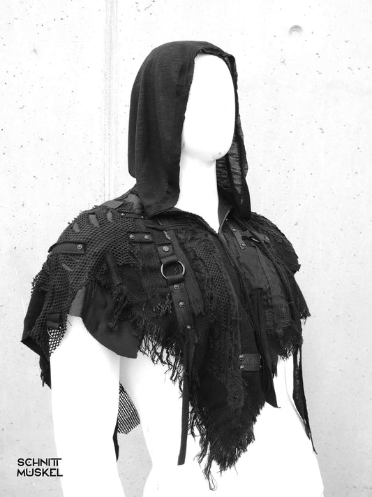 handgemachtes schwarzes Cape mit Kapuze Avantgarde
Post Apocalyptic Cape mit Schnallen und Nieten Unikat
Gothic Cape Unisex mit Kapuze Raw Look, Darkavantgarde, Gothiccape